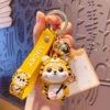 Porte Clés Chien Tigre -Animalière Décoration Magasin file 3007