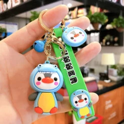 Porte Clés Pingouin Dinosaure