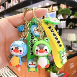 Porte Clés Pingouin Dinosaure -Animalière Décoration Magasin file 3192