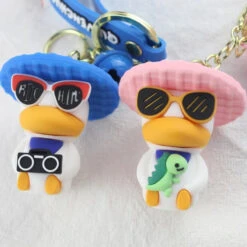 Porte Clés Canard Vacances Dino -Animalière Décoration Magasin file 3508