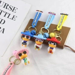 Porte Clés Canard Vacances Dino -Animalière Décoration Magasin file 3511